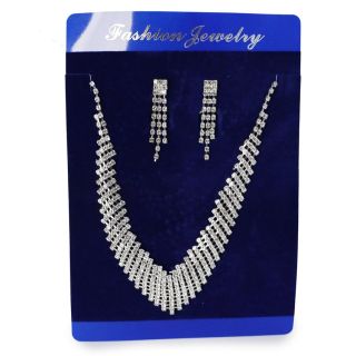 Collar Corto De Metal Plateado Ovalado Con Líneas De Pedrería Y Aretes Largos Blíster Azul 17 Cm | G-358-168-6